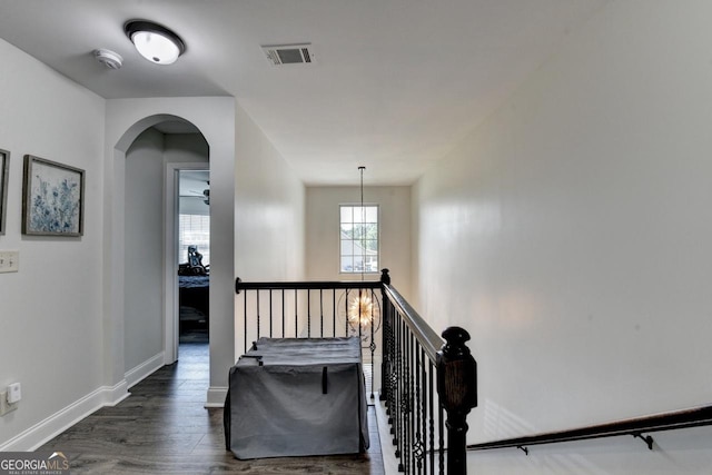 2410 Melton Common Dr, Dacula, GA 30019 - stairway featuring wood finished floors and arched walkways
