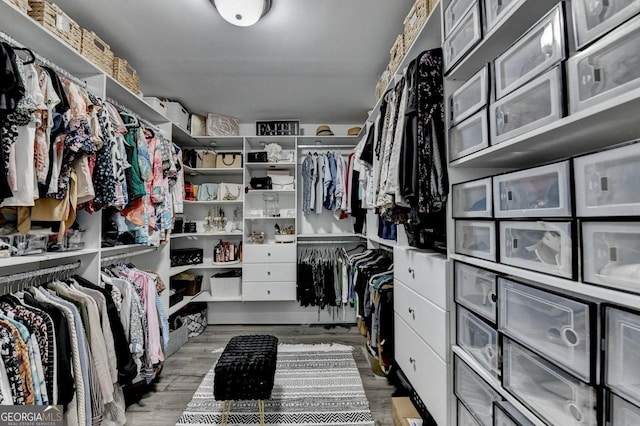 2410 Melton Common Dr, Dacula, GA 30019 - spacious closet featuring wood finished floors