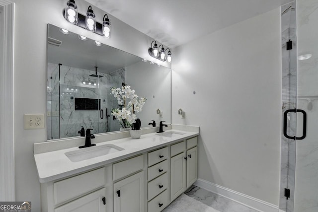 2410 Melton Common Dr, Dacula, GA 30019 - bathroom featuring marble look tiles, double vanity, and a marble finish shower