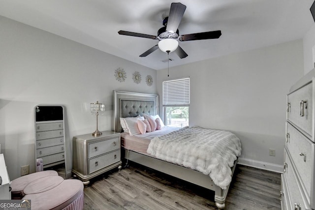 2410 Melton Common Dr, Dacula, GA 30019 - bedroom with wood finished floors and a ceiling fan