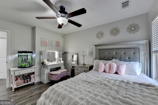 2410 Melton Common Dr, Dacula, GA 30019 - bedroom featuring wood finished floors and a ceiling fan