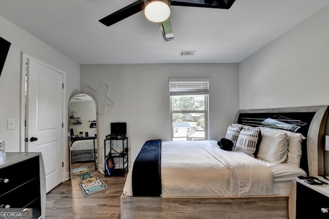 2410 Melton Common Dr, Dacula, GA 30019 - bedroom featuring wood finished floors and ceiling fan