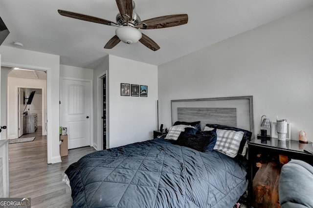 2410 Melton Common Dr, Dacula, GA 30019 - bedroom featuring wood finished floors and ceiling fan