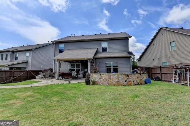 2410 Melton Common Dr, Dacula, GA 30019 - rear view of house with a patio, a fenced backyard, and outdoor lounge area