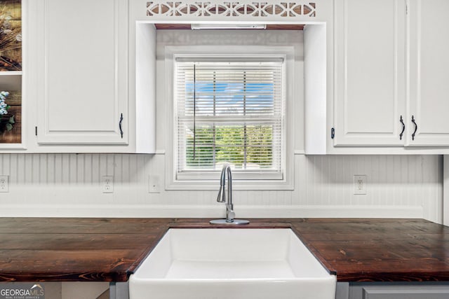 665 Center Of The World Rd, Canon, GA 30520 - kitchen featuring white cabinetry and dark countertops