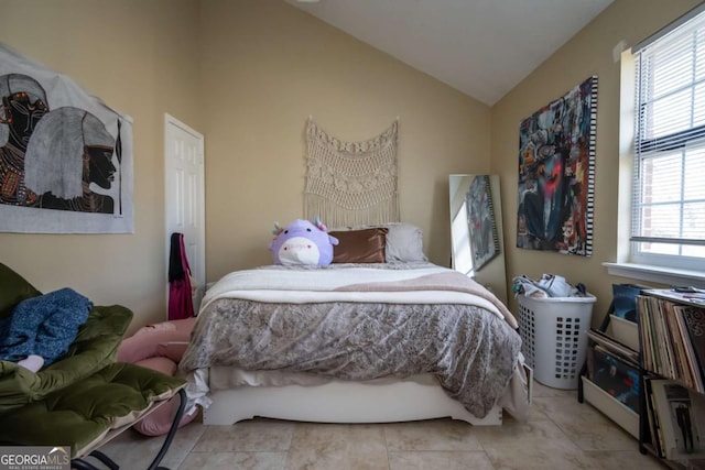 2165 Milledge Ave Unit F4, Athens, GA 30605 - bedroom with vaulted ceiling and multiple windows