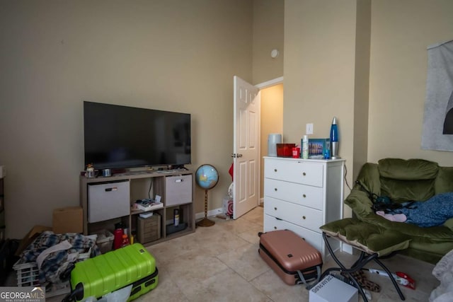 2165 Milledge Ave Unit F4, Athens, GA 30605 - rec room featuring light tile patterned flooring and a high ceiling