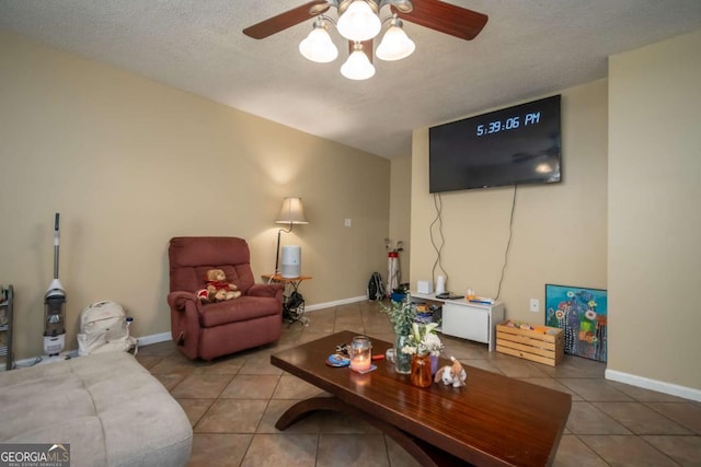 2165 Milledge Ave Unit F4, Athens, GA 30605 - living area with tile patterned floors, ceiling fan, and a textured ceiling