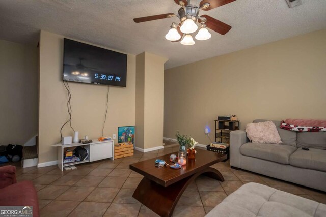 2165 Milledge Ave Unit F4, Athens, GA 30605 - tiled living room featuring ceiling fan and a textured ceiling