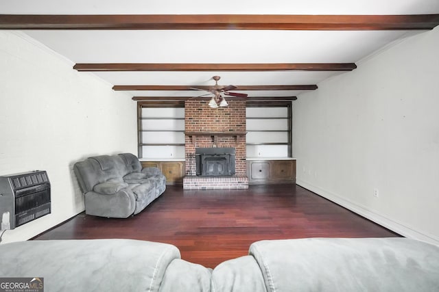105 Skyline Dr, Barnesville, GA 30204 - living room with a brick fireplace, heating unit, wood finished floors, beam ceiling, and ceiling fan