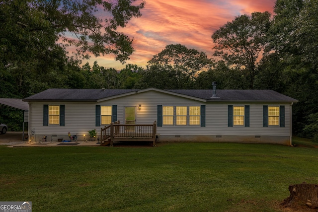 319 Aderhold Rd, Carnesville, GA 30521 - view of front of home with crawl space, a lawn, a wooden deck, view of scattered trees, and a patio