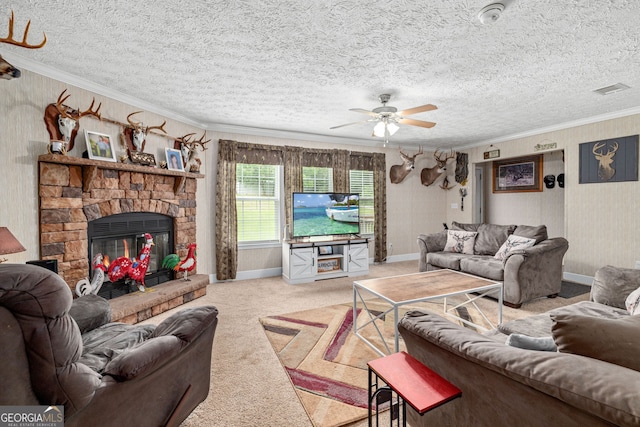 319 Aderhold Rd, Carnesville, GA 30521 - living area featuring ceiling fan, ornamental molding, carpet flooring, a stone fireplace, and a textured ceiling