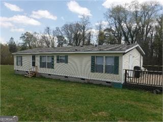 652 Duncan Rd, Carrollton, GA 30116 - back of house featuring crawl space, a lawn, a deck, and entry steps