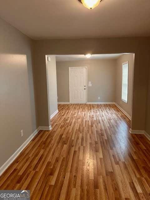 519 Roy St SW, Atlanta, GA 30310 - empty room featuring wood finished floors and baseboards