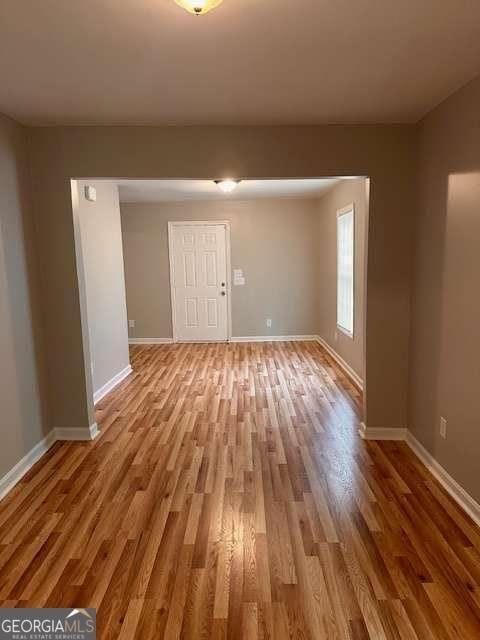 519 Roy St SW, Atlanta, GA 30310 - empty room with wood finished floors and baseboards