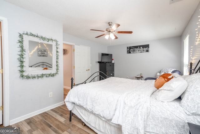 183 Venture Path, Hiram, GA 30141 - bedroom with wood finished floors and a ceiling fan