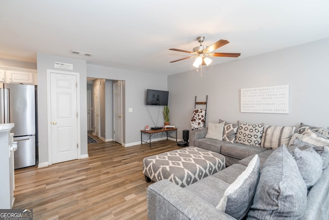 183 Venture Path, Hiram, GA 30141 - living room featuring light wood-style floors and a ceiling fan