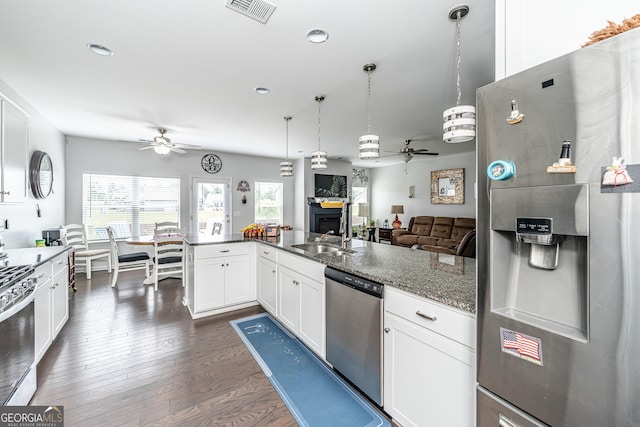 107 Topaz St, Calhoun, GA 30701 - kitchen featuring appliances with stainless steel finishes, ceiling fan, dark wood finished floors, white cabinets, and recessed lighting