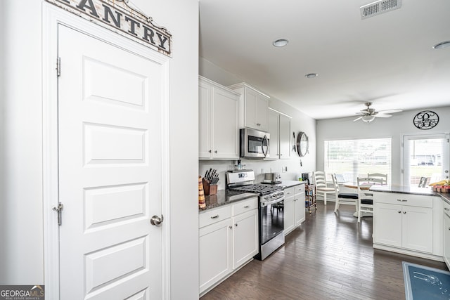 107 Topaz St, Calhoun, GA 30701 - kitchen with stainless steel appliances, a ceiling fan, dark wood finished floors, white cabinets, and recessed lighting