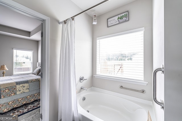107 Topaz St, Calhoun, GA 30701 - bathroom featuring a tub and a shower with shower curtain