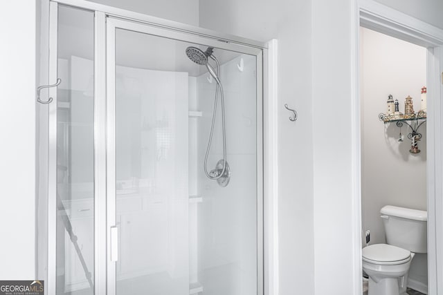107 Topaz St, Calhoun, GA 30701 - bathroom featuring a stall shower and toilet