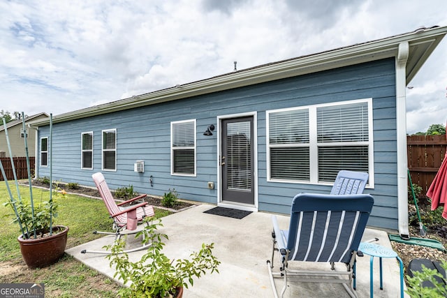 107 Topaz St, Calhoun, GA 30701 - rear view of property with a patio area