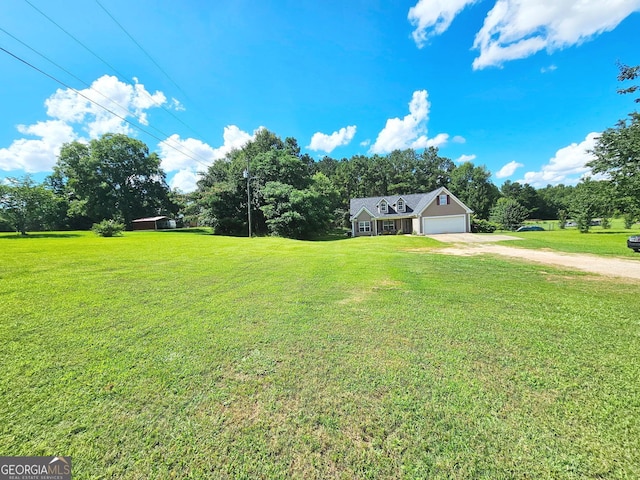 2653 Teamon Rd, Griffin, GA 30223 - view of front of house featuring driveway, a front yard, and an attached garage