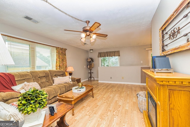 44 Twiggs Cor, Peachtree City, GA 30269 - living room with a ceiling fan and light wood-style flooring
