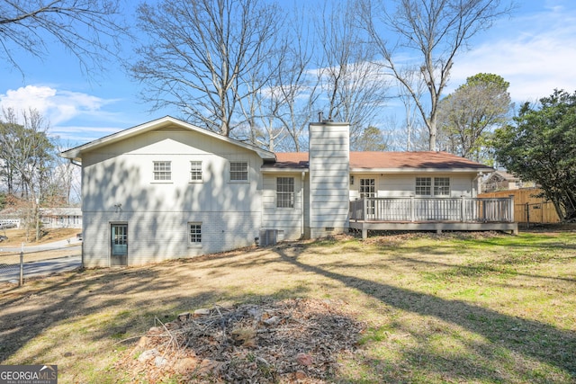 2511 Due W Cir NW, Kennesaw, GA 30152 - rear view of house featuring a wooden deck, a chimney, and crawl space