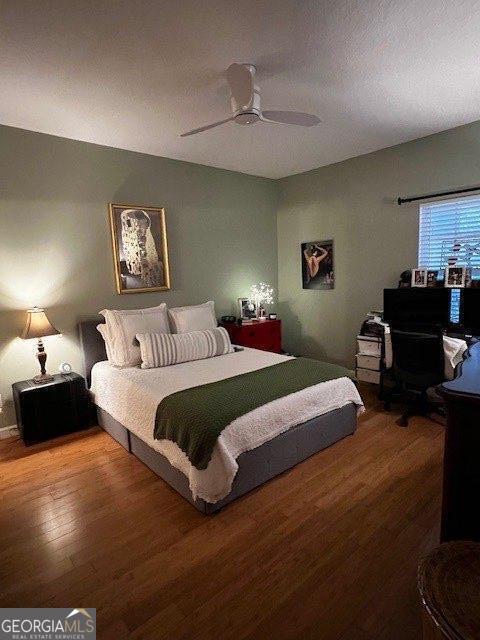 324 Moss Creek Ln, Brunswick, GA 31520 - bedroom featuring wood finished floors and a ceiling fan