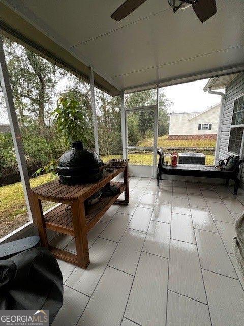 324 Moss Creek Ln, Brunswick, GA 31520 - sunroom / solarium with a ceiling fan and healthy amount of natural light