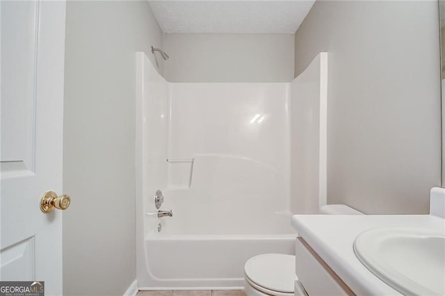 1643 Jackson Way, Atlanta, GA 30318 - bathroom with vanity, tub / shower combination, tile patterned flooring, and a textured ceiling