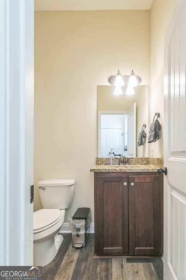 309 E 41st St, Savannah, GA 31401 - half bath with vanity and wood finished floors