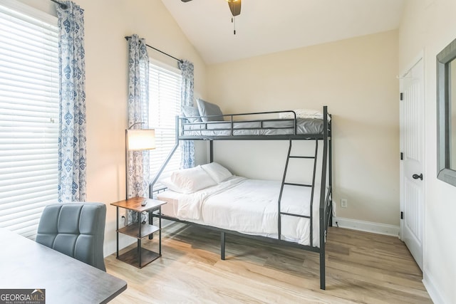 309 E 41st St, Savannah, GA 31401 - bedroom with wood finished floors and vaulted ceiling