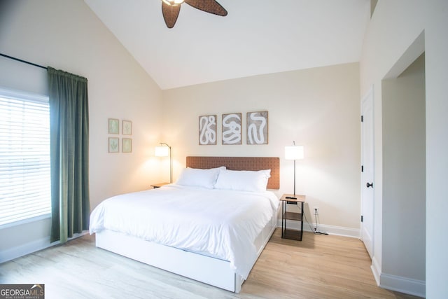 309 E 41st St, Savannah, GA 31401 - bedroom featuring multiple windows, wood finished floors, vaulted ceiling, and ceiling fan