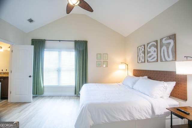 309 E 41st St, Savannah, GA 31401 - bedroom featuring vaulted ceiling, light wood-style floors, ceiling fan, and connected bathroom