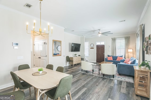 309 E 41st St, Savannah, GA 31401 - dining space with wood finished floors, ceiling fan, a chandelier, and crown molding