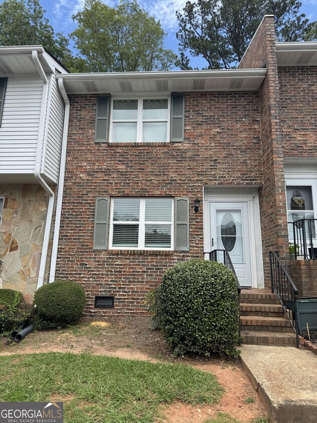 501 Carlton Rd Unit 3-D, Palmetto, GA 30268 - view of property featuring crawl space and brick siding