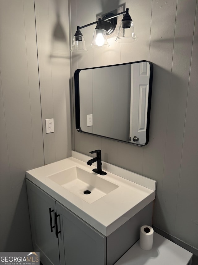 501 Carlton Rd Unit 3-D, Palmetto, GA 30268 - bathroom with vanity and a decorative wall