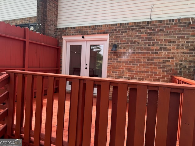 501 Carlton Rd Unit 3-D, Palmetto, GA 30268 - property entrance with french doors, brick siding, and a deck