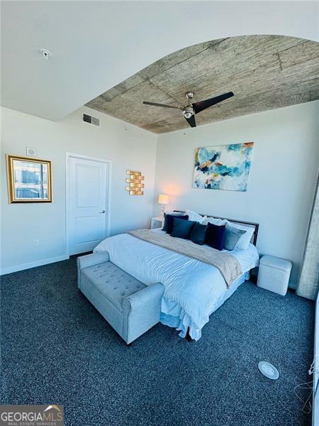 400 Peachtree St Unit 3412, Atlanta, GA 30308 - bedroom with carpet flooring and ceiling fan