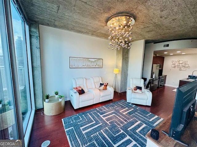 400 Peachtree St Unit 3412, Atlanta, GA 30308 - living room featuring wood finished floors and a chandelier