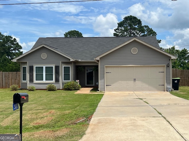 307 Pardue Dr, Thomaston, GA 30286 - ranch-style home with a garage, driveway, and roof with shingles