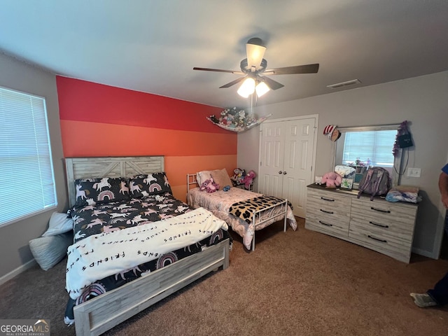 307 Pardue Dr, Thomaston, GA 30286 - carpeted bedroom with ceiling fan and a closet
