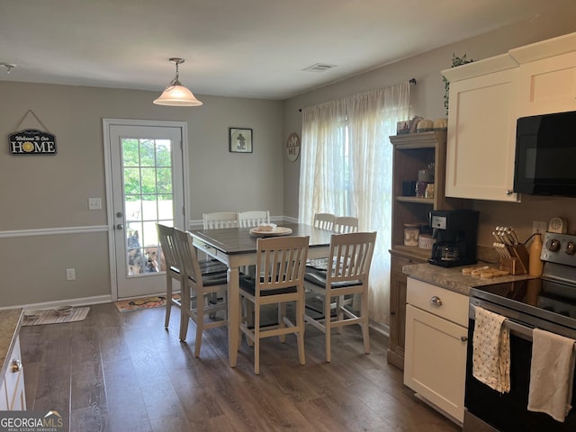 307 Pardue Dr, Thomaston, GA 30286 - dining room featuring dark wood-style floors