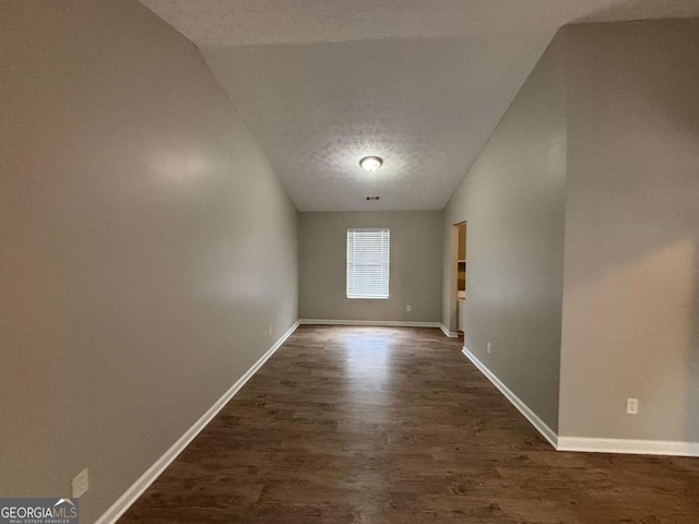 2183 Ramblewood Cir, Decatur, GA 30035 - unfurnished room with dark wood-style flooring and a textured ceiling
