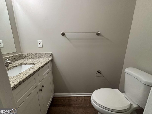 2183 Ramblewood Cir, Decatur, GA 30035 - half bathroom with vanity and wood finished floors