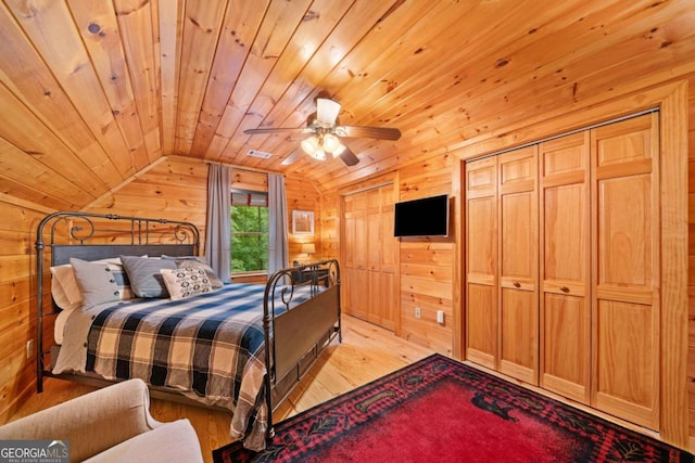 64 Bear Belly Path, Ellijay, GA 30540 - bedroom featuring light wood-type flooring, wooden walls, lofted ceiling, and wooden ceiling