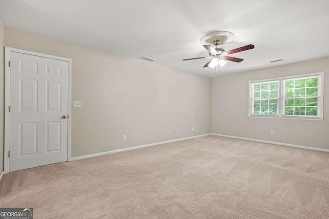 4211 Burnt Hickory Rd NW, Marietta, GA 30064 - empty room featuring light carpet and a ceiling fan
