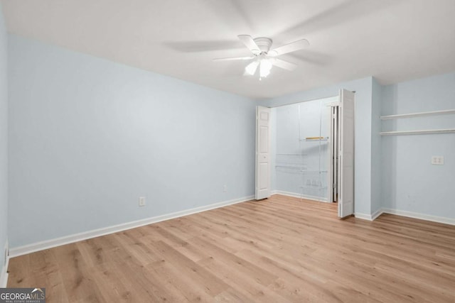4211 Burnt Hickory Rd NW, Marietta, GA 30064 - unfurnished bedroom with light wood-style floors, a ceiling fan, and a closet